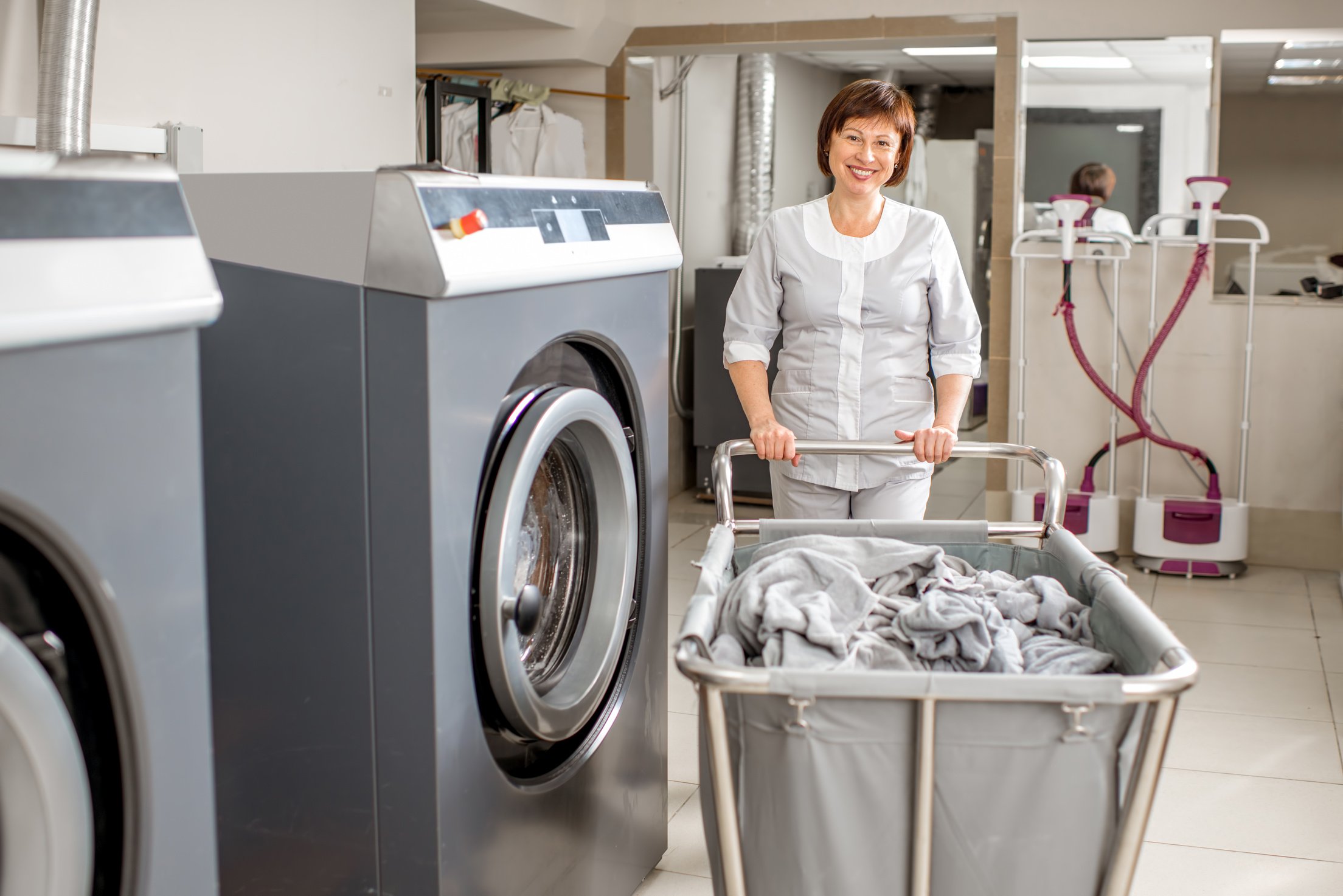 Senior Washwoman in the Laundry